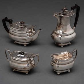 Set of coffee pot, teapot, milk pot and sugar bowl in Spanish silver punched XX century
