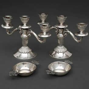 Pair of three-light candlesticks and two catavinos in Spanish silver and punched twentieth century.