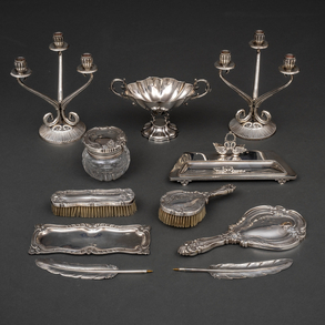Set of writing desk, pair of candlesticks, set of dressing table and center in Spanish silver and punched twentieth century.