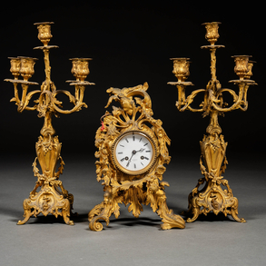 French table clock in Louis XV style with five-light candelabra garnish of the nineteenth century