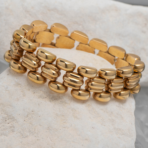 Articulated bracelet in 18kt yellow gold.