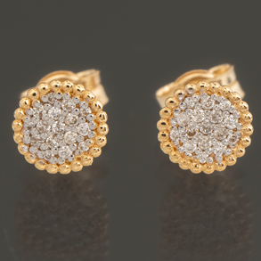 Pareja de pendientes en oro amarillo de 18kt y pavé de brillantes.