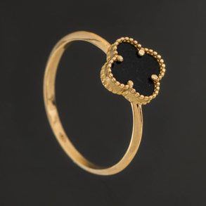 Van Cleef style ring in 18kt yellow gold and black onyx.