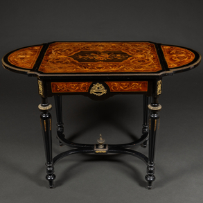 Napoleon III two-wing table in black ebonized wood with gilded bronze applications and profuse floral marquetry. XIX Century