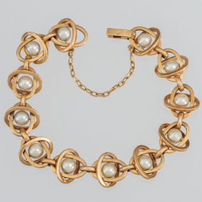 Bracelet in 18kt yellow gold and cultured pearls