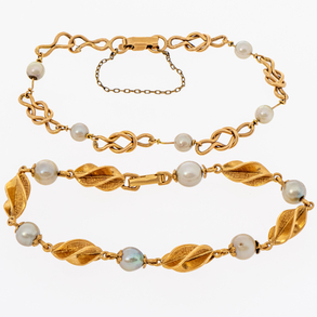 Conjunto de dos pulseras en oro amarillo e 18 Kt y perlas.