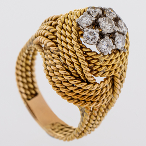 Ring in 18 Kt yellow gold with diamonds.