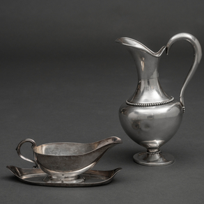 Set of water pitcher and sauceboat in Spanish silver and punched twentieth century.