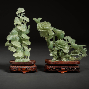 “Birds” Set of two figures in carved green jade. Chinese work, XX Century.