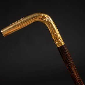 Wooden cane with gold plated handle of the XX century.