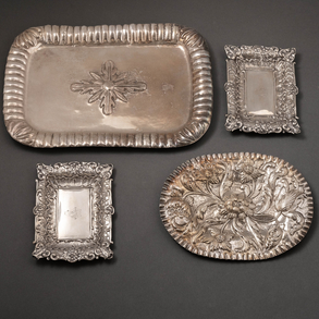 Set of four 20th century Spanish silver trays.