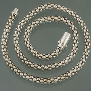 18kt white gold bead necklace.