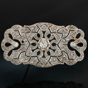 Antique brooch in 18kt yellow and white gold with diamonds.
