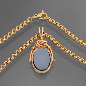 18kt yellow gold link chain with 18kt rose gold and enamel pendant.