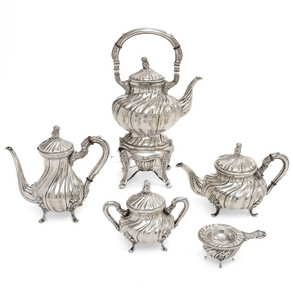 Set of coffee pot, teapot, sugar bowl, strainer and samovar in Spanish silver, 20th century.