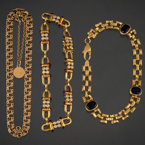 Set of three link bracelets in 18kt yellow gold.