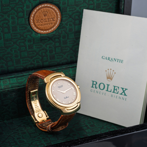 Rolex Cellini watch model 6623 with 18kt yellow gold case and buckle and brown leather strap.