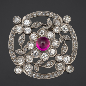 Round brooch in white gold with old-cut diamonds and red tourmaline