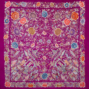 Manila shawl in silk embroidered with different colored threads on a purple background from the end of the XIX century.