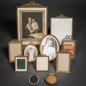 Set of eleven Louis XVI style gilt bronze portrait frames, 19th-20th century.