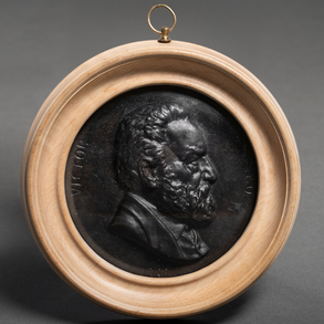 “Victor Hugo” 19th century blued bronze medallion of Victor Hugo's face in profile.