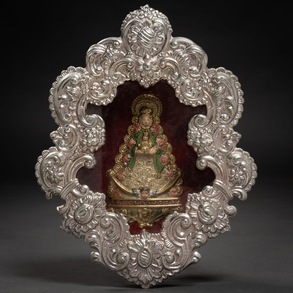 Reliquary chapel in silver embossed with the Virgin and child of the nineteenth century.
