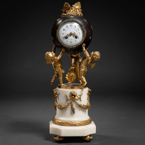 French table clock Louis XVI style gilt and blued bronze with white marble base. French work of the XIX century