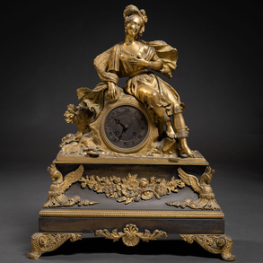 Restoration period table clock in gilded and blued bronze of the nineteenth century.