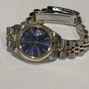 Rolex Oyster perpetual date watch in steel 6179 model and 18kt yellow gold.