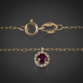 Cadena de eslabones en oro amarillo de 18kt y roseta de zafiro y brillantes.
