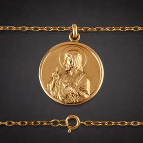Cadena con medalla circular de la virgen con el niño en oro amarillo de 18kt.