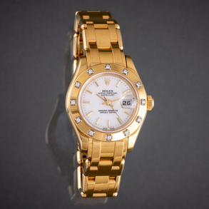 Reloj Rolex Oyster perpetual Datejust de dama modelo 80318 en oro amarillo de 18 kt y brillantes en la esfera.