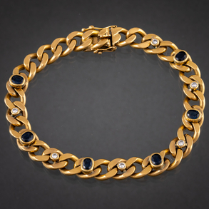 Pulsera de calabrote en oro amarillo de 18 kt con zafiros y brillantes alternados.