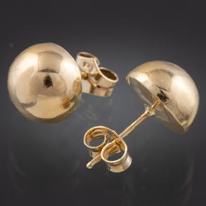 Pareja de pendientes semiesféricos  en oro amarillo de 18 kt.