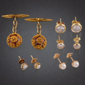 Miscelánea de gemelos y pendientes en oro amarillo de 18 kt.
