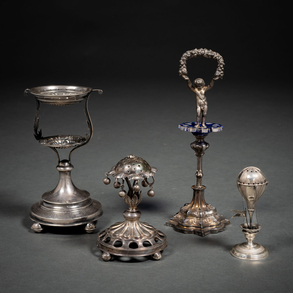 Conjunto de cuatro palilleros en plata punzonada del siglo XIX-XX.