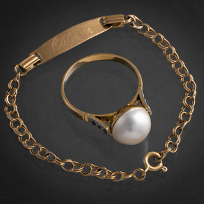 Conjunto de anillo y pulsera en oro amarillo de 18 kt.