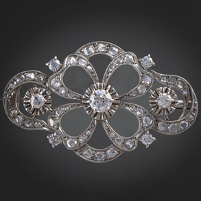 Bonito broche en oro blanco de 18kt con brillantes.