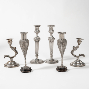 Conjunto de tres parejas de candeleros en plata española y punzonada del siglo XX.