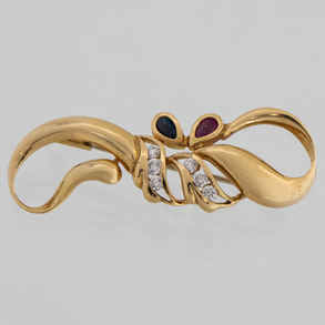 Broche en forma de lazo en oro amarillo de 18 kt