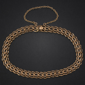 Pulsera de  doble eslabón barbado en oro amarillo de 18 kt.