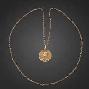 Cadena de eslabones y medalla de la Virgen en oro amarillo de 18 kt.