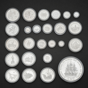 Conjunto de veinticinco monedas conmemorativas AG